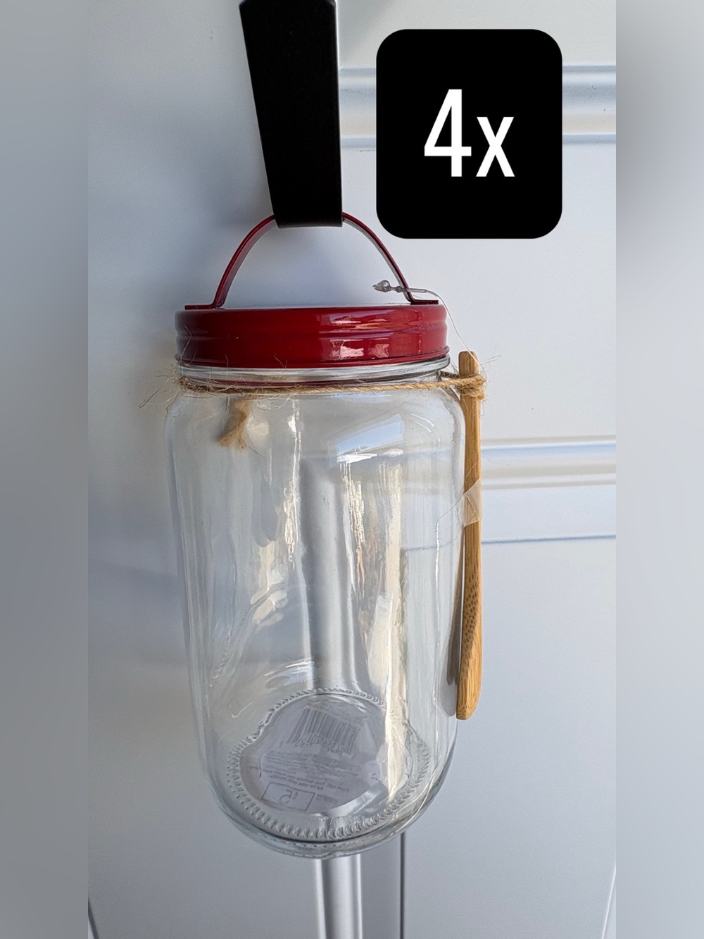 Set of 4 glass storage jars with wooden spoon form Target Bullseye